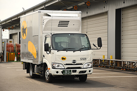 Sales driver inspects a truck.